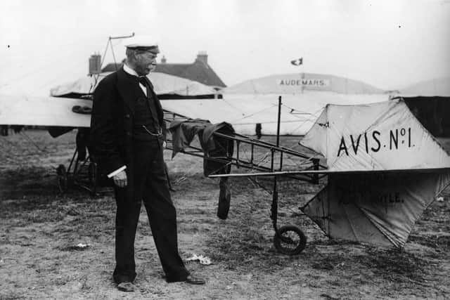 Sir Thomas Lipton views an aeroplane at the Bournemouth Aviation meeting.