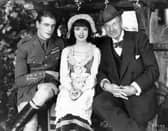 Sir Thomas Johnstone Lipton (1850 - 1931) the Scottish businessman and millionaire philanthropist is visiting Gary Cooper (1901 - 1961) and Colleen Moore (1900 - 1988), leading lady of the silent screen, on the production set of their latest film, 'Lilac Time' (aka 'Love Never Dies'). The film was directed by George Fitzmaurice for First National.  