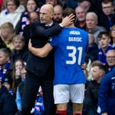 Rangers' Borna Barisic (R) with manager Phillipe Clement after being forced off with an injury against Hibs in October 2023