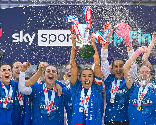 Rangers' nicola Docherty lifts the Sky Sports Cup 
