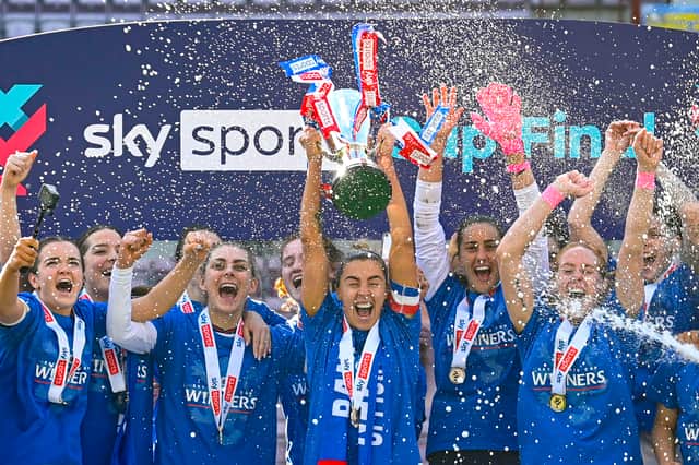 Rangers' nicola Docherty lifts the Sky Sports Cup 