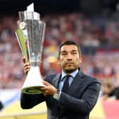 Giovanni van Bronckhorst presents the UEFA Nations League trophy