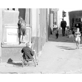 Children play around Anderston, one shows off his bogey - something you don't see on the streets of Glasgow anymore
