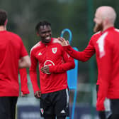 Rabbi Matondo of Wales looks on during a training session at The Vale Resort 