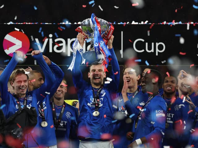 Borna Barisic of Rangers lifts the trophy during the Viaplay Cup Final 