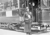 A tram conductor in her winter uniform, possibly in Glasgow, 1915. Glasgow pioneered the use of female operatives on its public transport system during the war. Male colleagues opposed their presence, declaring such work to be 'unwomanly', physically demanding and morally dangerous. 