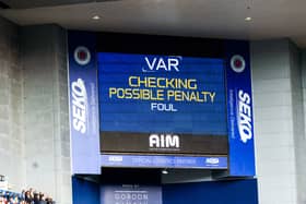 VAR is checked for a possible Rangers Penalty