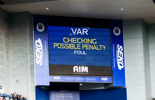 VAR is checked for a possible Rangers Penalty