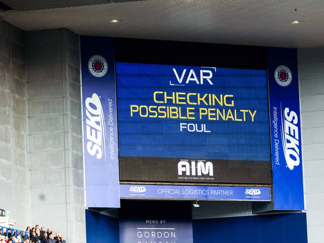 VAR is checked for a possible Rangers Penalty