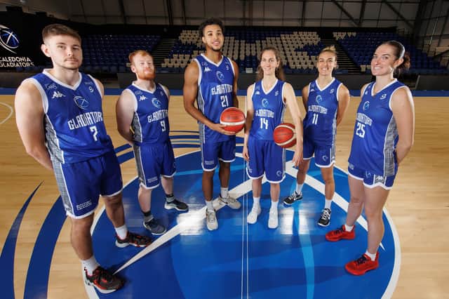 Group shot of the men’s and women’s team. Names l-r: Fraser Malcolm, Jonny Bunyan, Clifton Moore, Erin McGarrachan, Ariadna Pujol and Kirsty Brown