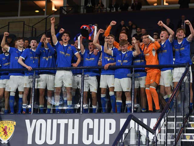 Rangers celebrate with the trophy during a Youth Cup Final match against Hearts at Hampden Park 