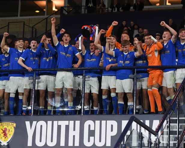 Rangers celebrate with the trophy during a Youth Cup Final match against Hearts at Hampden Park 