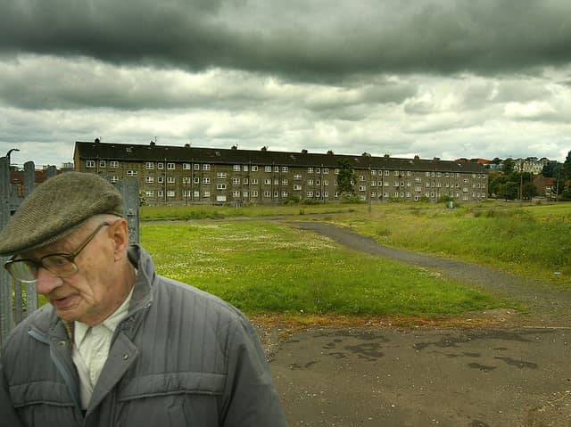 An unidentified man walks by Barlanark. In 2004 Barlanark had been identified in a survey as officially being the most deprived area of Scotland. The study measures deprivation by health, housing, income, unemployment and education, and whilst Barlanark topped the scale of multiple deprivation, the city of Glasgow housed 17 of the 20 most deprived areas. 
