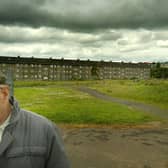 An unidentified man walks by Barlanark. In 2004 Barlanark had been identified in a survey as officially being the most deprived area of Scotland. The study measures deprivation by health, housing, income, unemployment and education, and whilst Barlanark topped the scale of multiple deprivation, the city of Glasgow housed 17 of the 20 most deprived areas. 