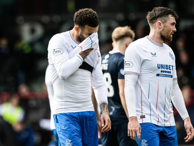 Rangers' Connor Goldson (L) and John Souttar look dejected at full-time.
