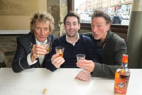 Rod Stewart snapped with Wolfie's co-founder Duncan Frew alongside old friend Johnny McLaughlin of Johnny Mac and the Faithful