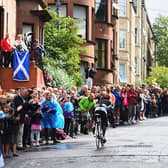 Sebastian Kigongo Semakula of Uganda is cheered on by spectators in the Men's Road Race during day eleven of the Glasgow 2014 Commonwealth Games on August 3, 2014.
