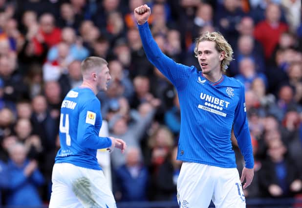 Todd Cantwell of Rangers celebrates after Cyriel Dessers of Rangers (not pictured) scores his team's second goal against Hearts
