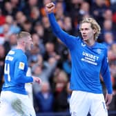 Todd Cantwell of Rangers celebrates after Cyriel Dessers of Rangers (not pictured) scores his team's second goal against Hearts