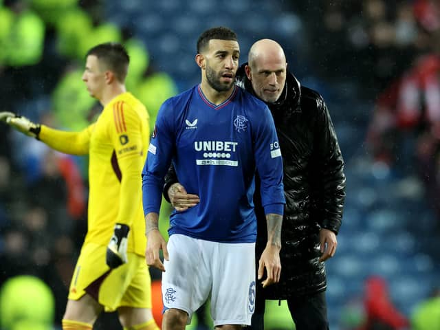 Connor Goldson of Rangers is consoled by Philippe Clement