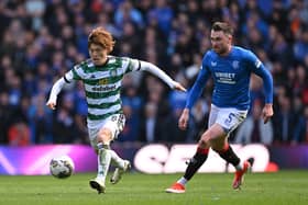  Celtic player Kyogo Furuhashi (l) is challenged by John Souttar of Rangers