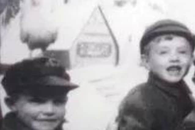 An early photo of brothers Angus and Malcolm Young who ere born and raised in Cranhill at 6 Skerryvore Road in their formative years.