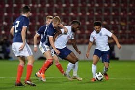 Joshua Onomah of England U21 is challenged by Ross McCrorie of Scotland U21 during the 2019 UEFA European Under-21 Championship Qualifier match