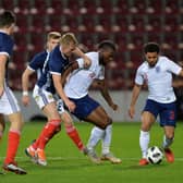 Joshua Onomah of England U21 is challenged by Ross McCrorie of Scotland U21 during the 2019 UEFA European Under-21 Championship Qualifier match