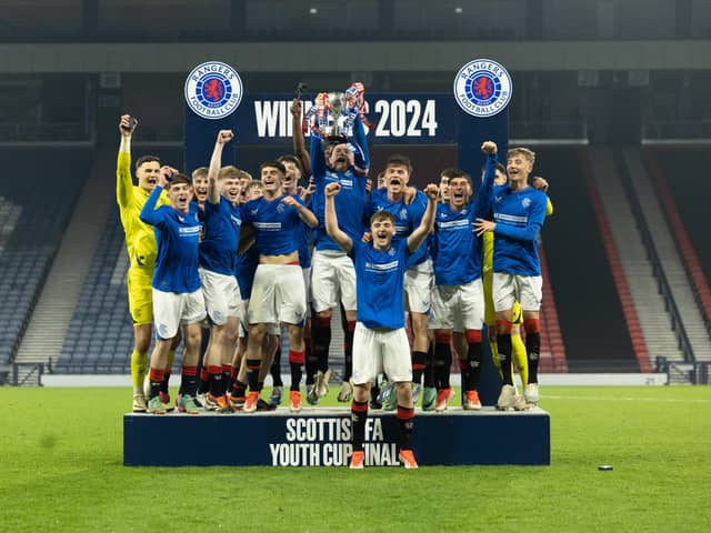 The Rangers squad lift the Scottish Youth Cup after victory over Aberdeen at Hampden Park