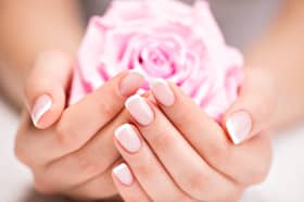 Four French manicure ideas, including classic and modern designs, recommended by a celebrity Mylee manicurist. Stock image by Adobe Photos.