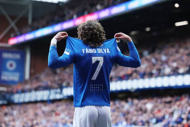 Fabio Silva of Rangers celebrates by pointing to the back of his jersey