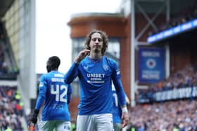 Fabio Silva of Rangers makes a gesture towards the home supporters as he celebrates scoring his team's opening goal 