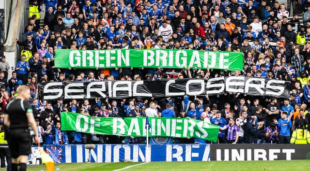 Rangers fans display a banner which reads 'Green Brigade Serial Losers Of Banners' 