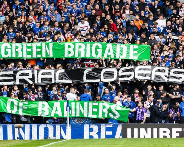 Rangers fans display a banner which reads 'Green Brigade Serial Losers Of Banners' 