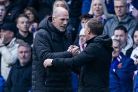 Rangers manager Phillipe Clement and Celtic boss Brendan Rodgers shake hands at full time at Ibrox
