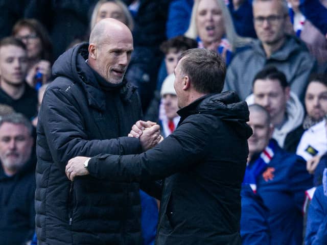 Rangers manager Phillipe Clement and Celtic boss Brendan Rodgers shake hands at full time at Ibrox
