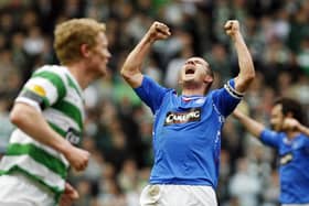 Rangers Captain Barry Ferguson (C) celebrates at the final whistle against Celtic in March 2008