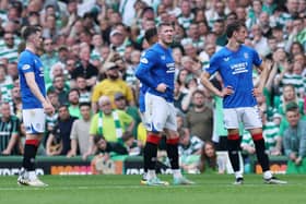 John Lundstram of Rangers looks on before being shown a red card