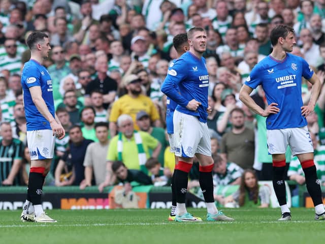 John Lundstram of Rangers looks on before being shown a red card