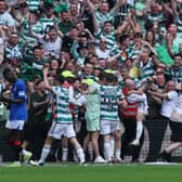 Celtic players celebrate. 