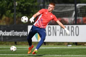 Rangers goalkeeper Jacob Pazikas warms up ahead of a UEFA Youth League match against Ajax in September 2022