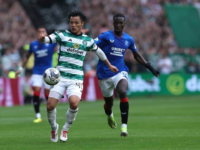 Reo Hatate of Celtic controls the ball whilst under pressure from Mohamed Diomande of Rangers during last weekend's Old Firm clash
