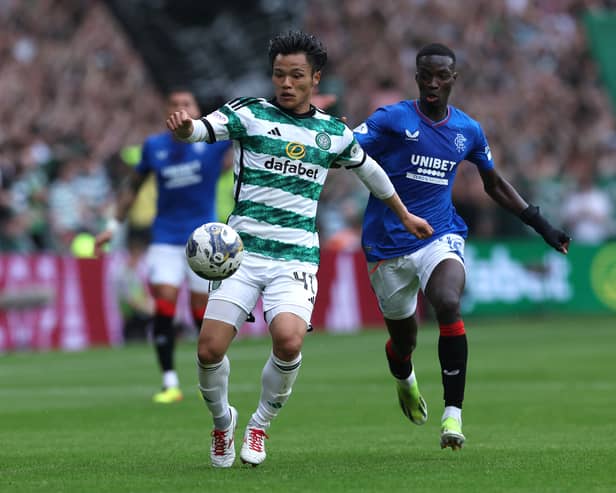 Reo Hatate of Celtic controls the ball whilst under pressure from Mohamed Diomande of Rangers during last weekend's Old Firm clash