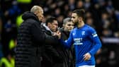 Rangers manager Philippe Clement shakes hands with midfielder Nicolas Raskin 