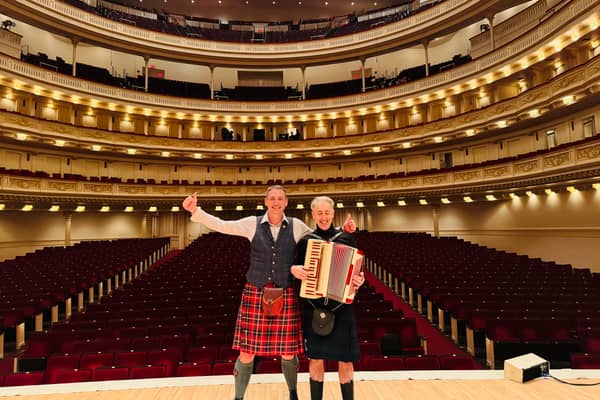 Gary Innes and Alan Cumming in Carnegie Hall., where Hoolie in New York will be hosted.