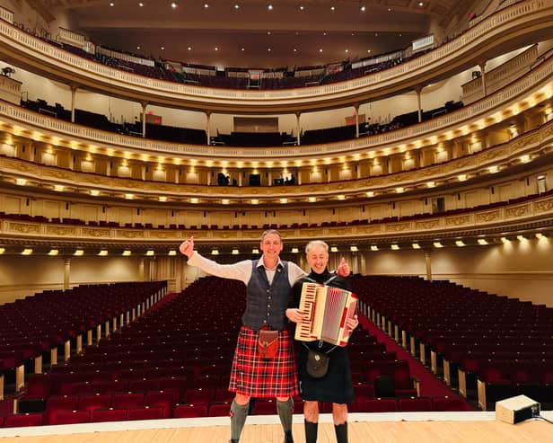 Gary Innes and Alan Cumming in Carnegie Hall., where Hoolie in New York will be hosted.