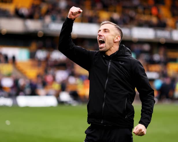 Gary O'Neil, head coach of Wolverhampton Wanderers celebrates victory against Luton Town.