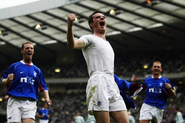 Barry Ferguson of Rangers celebrates scoring the second equalising goal with his team-mates 