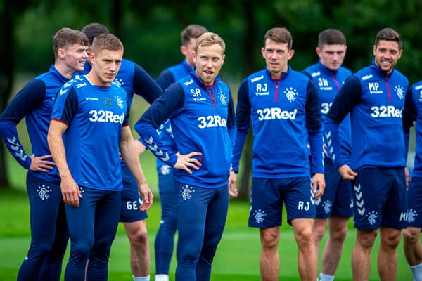 Rangers' Scott Arfield (centre) and Greg Docherty in training