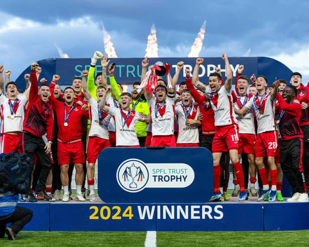 Airdrie lift the SPFL Trust Trophy during the SPFL Trust Trophy Final match between The New Saints and Airdrieonians at Falkirk Stadium